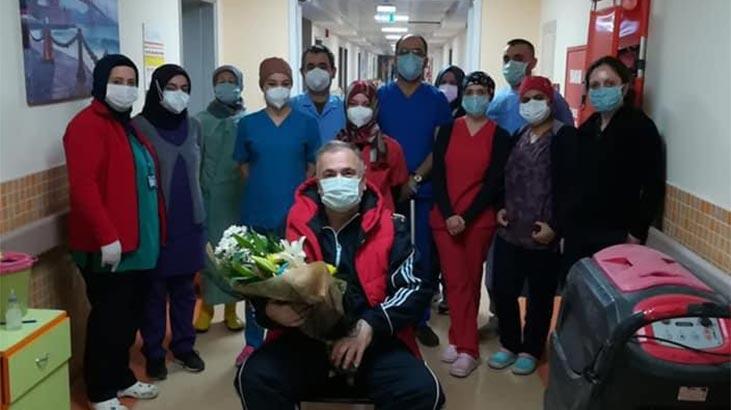 Koronavirüsü yenen doktor alkışlarla taburcu oldu